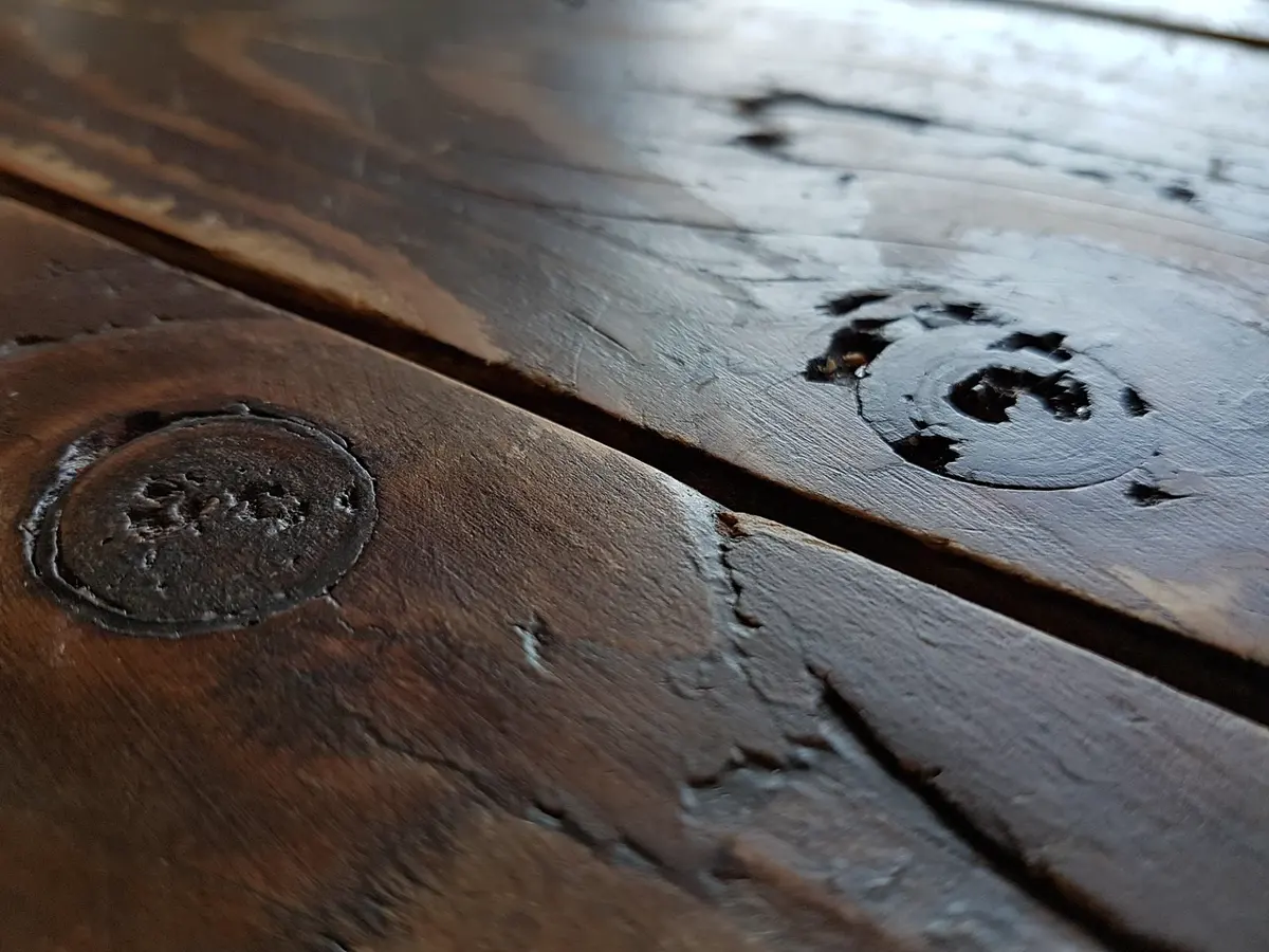 The counter — charred cedar grain, oiled nightly